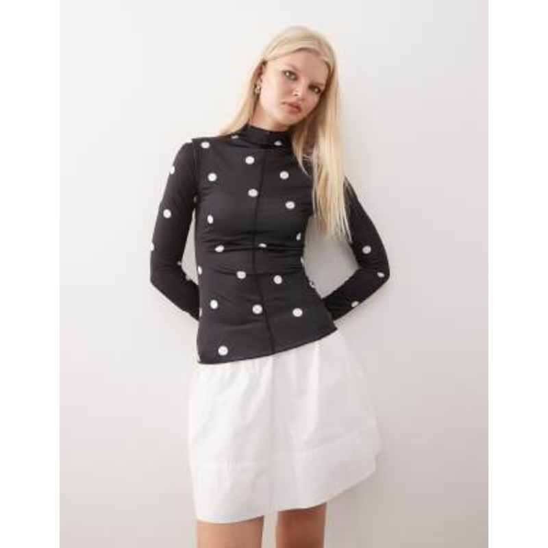 Monki long sleeve sheer T-shirt with front seam detail in black polka dot