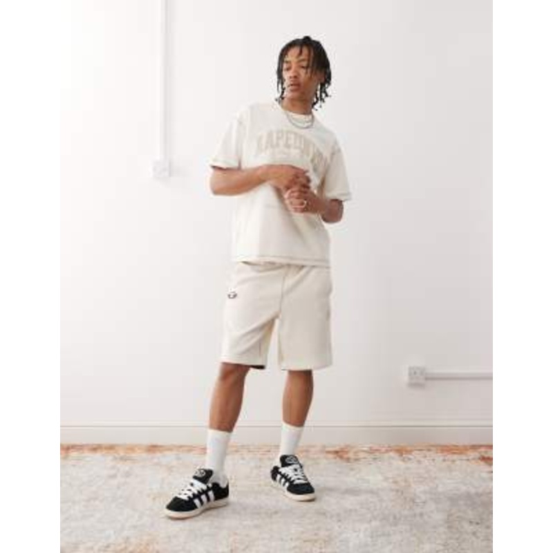 Aape by A Bathing Ape reversible logo sweatshirt fabric shorts in off white
