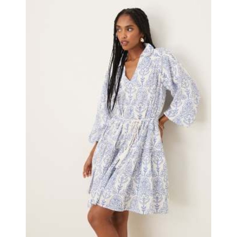 YAS puff sleeve boho mini dress with tie waist detail in blue and white tile print