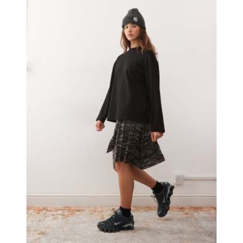 COLLUSION tie waist ring detail skirt in tiger camo print