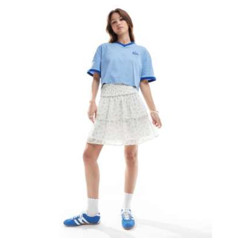 Vero Moda Smilla tiered mini skirt in blue ditsy floral
