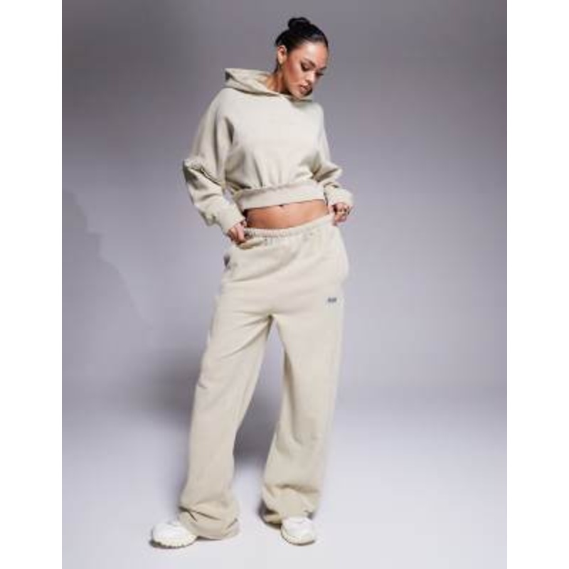 Weekend Collective hoodie and sweatpants set with hilo exposed seam detail in washed stone