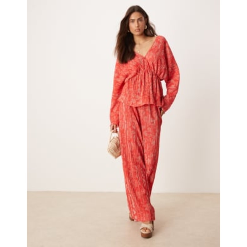 YAS floral printed plunge front plisse top and pants set in red and pink