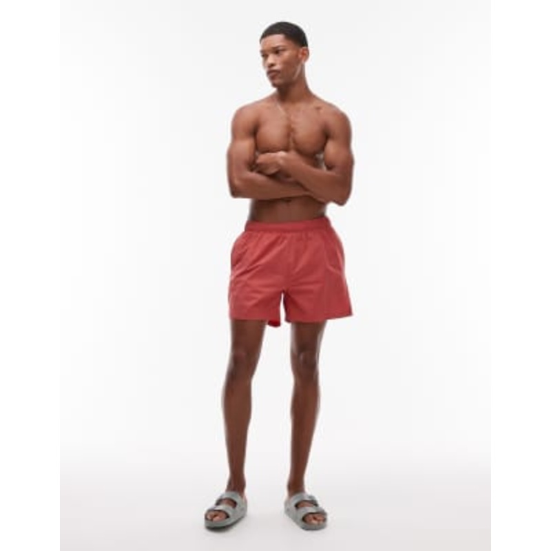 ARKET swim shorts in solmon red