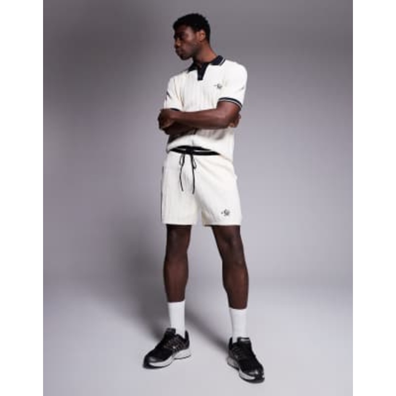 Alma De Ace logo knitted shorts in beige – part of a set