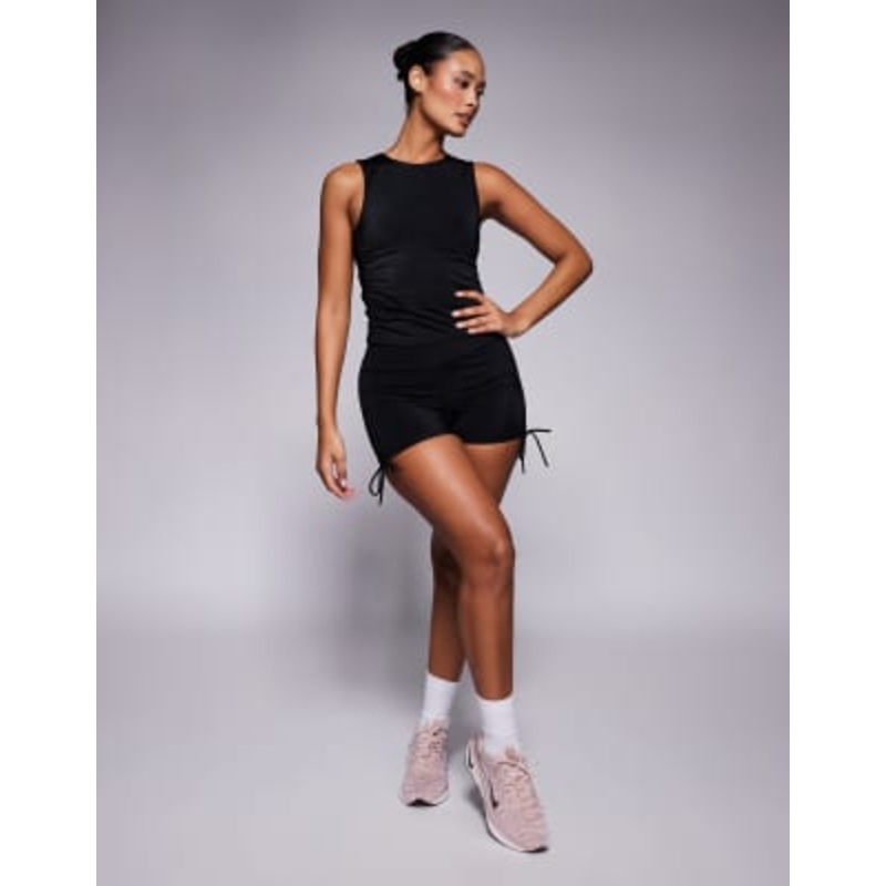 4505 Hourglass ruched side tie booty shorts in black high shine