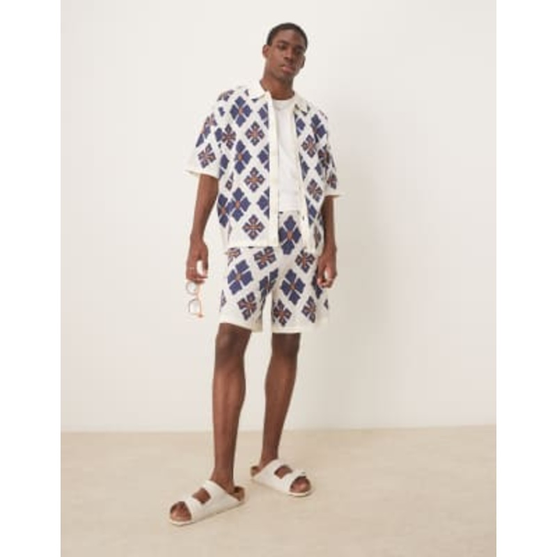 DESIGN relaxed knit button up polo shirt and shorts set with abstract pattern in blue