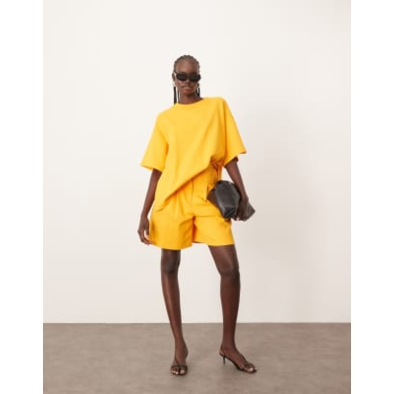 ARRANGE premium textured jersey city shorts in mango – part of a set