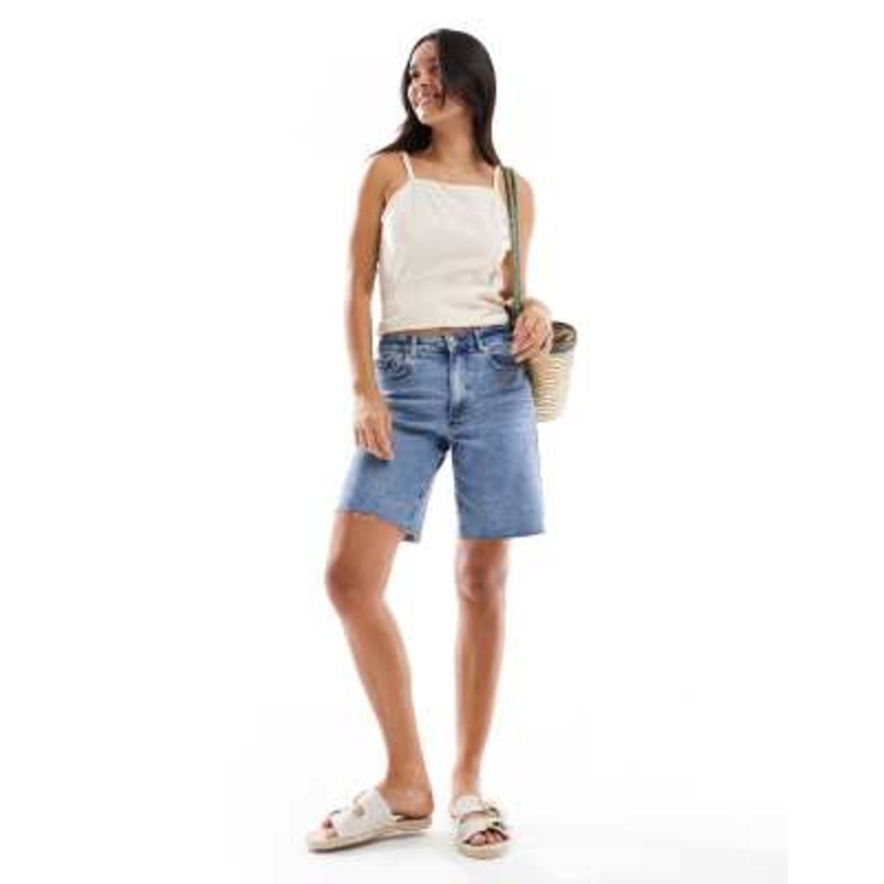 Vero Moda longline denim shorts in light blue wash