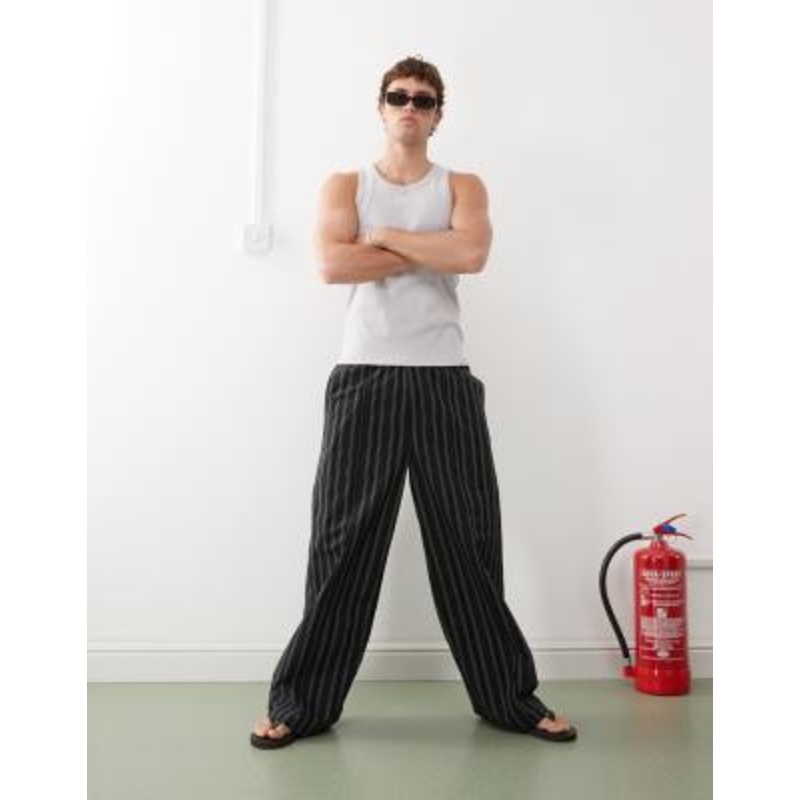 Weekday loose fit pants in black and beige stripe