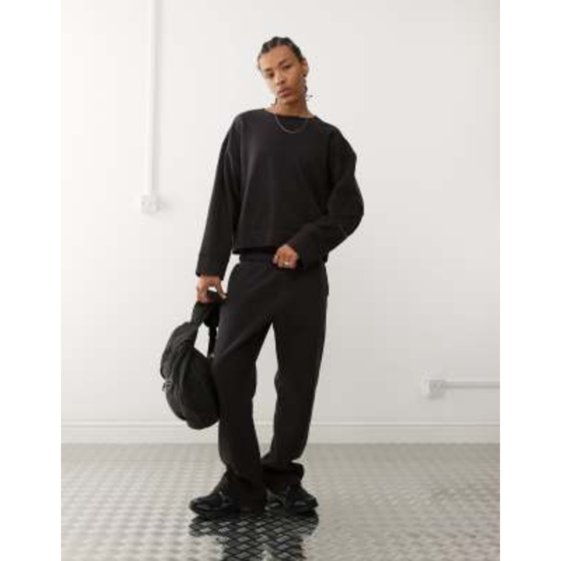 Weekday relaxed sweatpants in black acid wash – part of a set