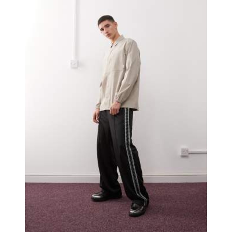 Weekday wide leg sweatpants with side tape details in black