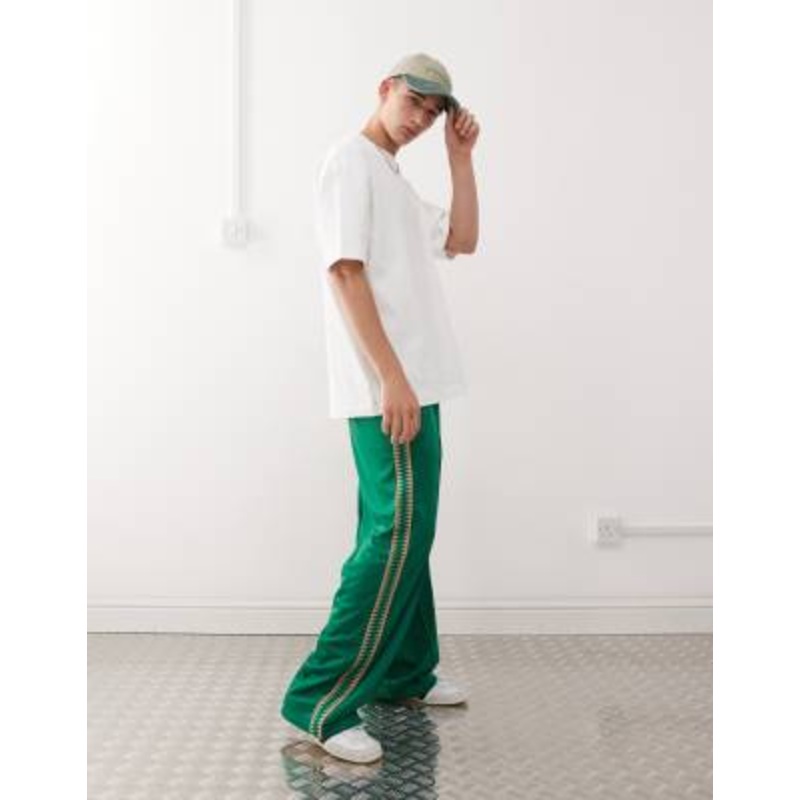 Weekday wide leg sweatpants with side tape detail in green