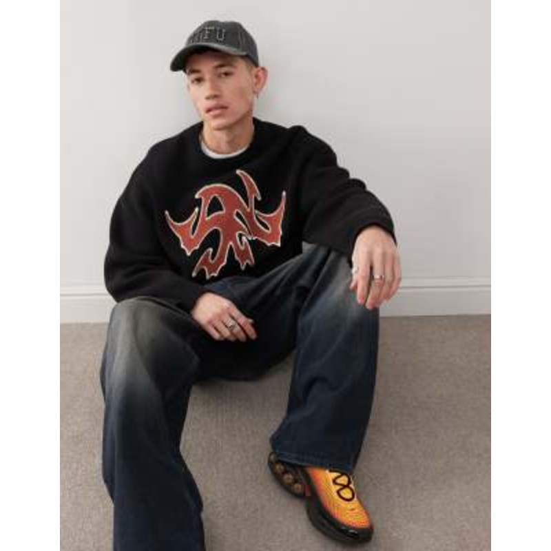 Weekday Cypher oversized sweater with red jacquard graphic in black