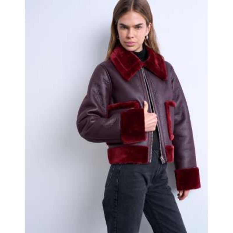 Topshop faux leather cropped jacket with red teddy contrast