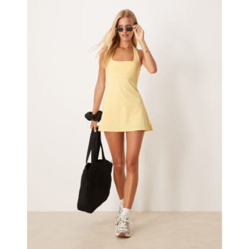 4505 active halter neck tennis dress with under shorts in pale yellow