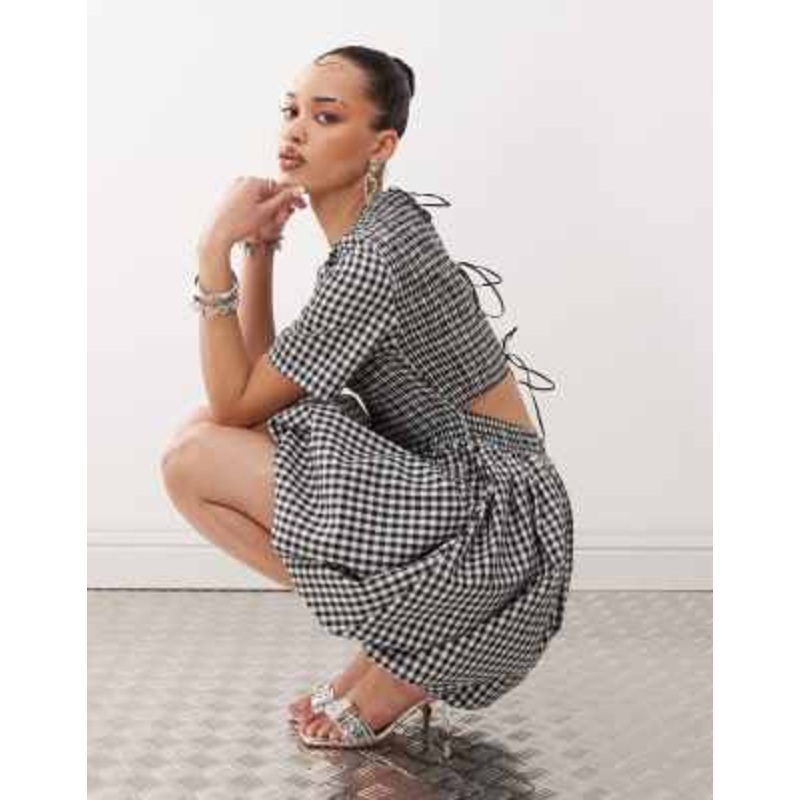 Amy Lynn shirred peplum mini dress with tie back in mono gingham