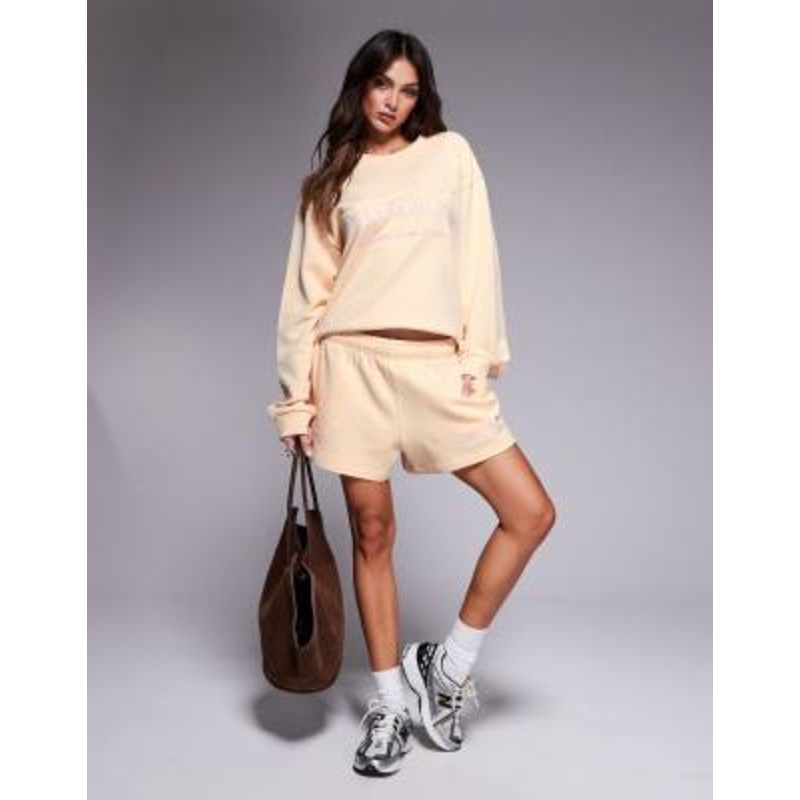 Weekend Collective set with embroidered logo in buttermilk