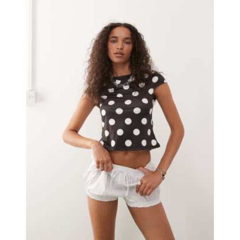 COLLUSION cap sleeve slash neck top in large black and white polka dots