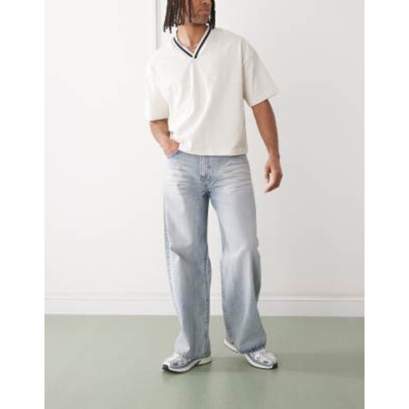 Cheap Monday looser baggy jeans in light wash blue