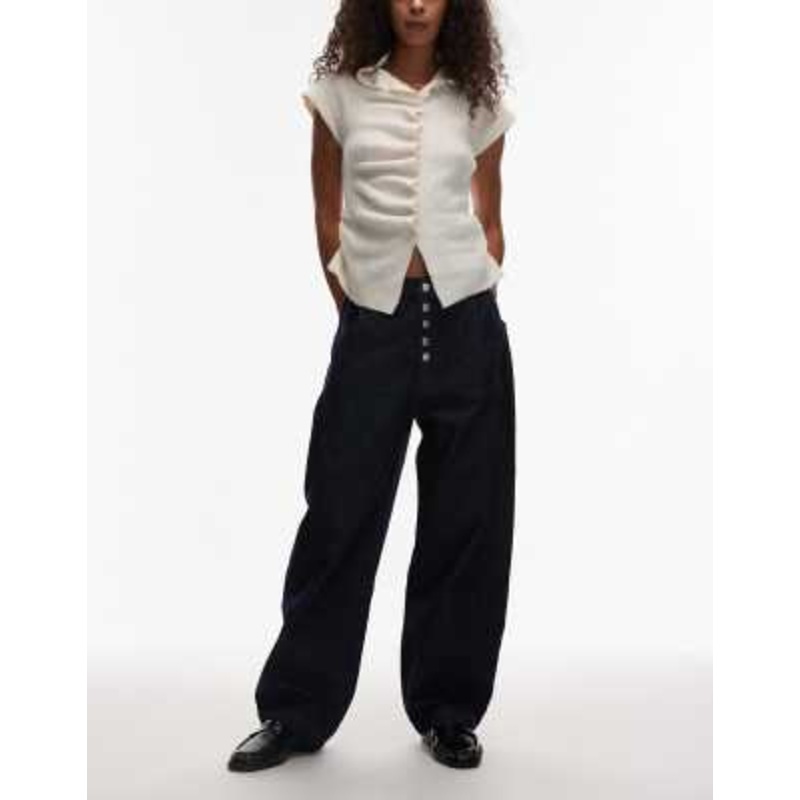 Reclaimed Vintage baggy barrel jeans with button fly in indigo rinse wash