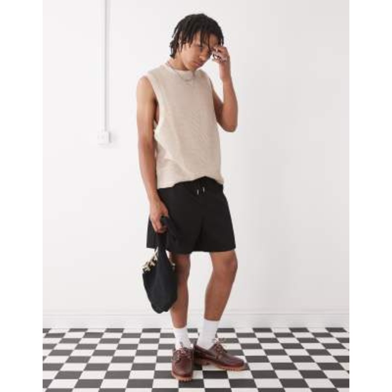 Reclaimed Vintage baggy fit shorter length pull on chino shorts in black