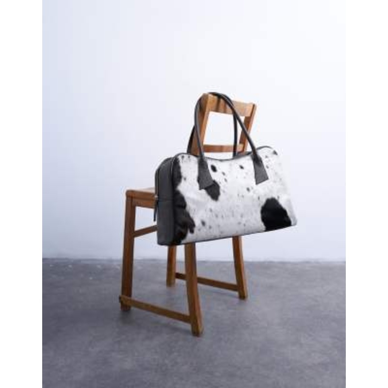 Topshop Suki real leather shoulder bowler bag in cow print pony