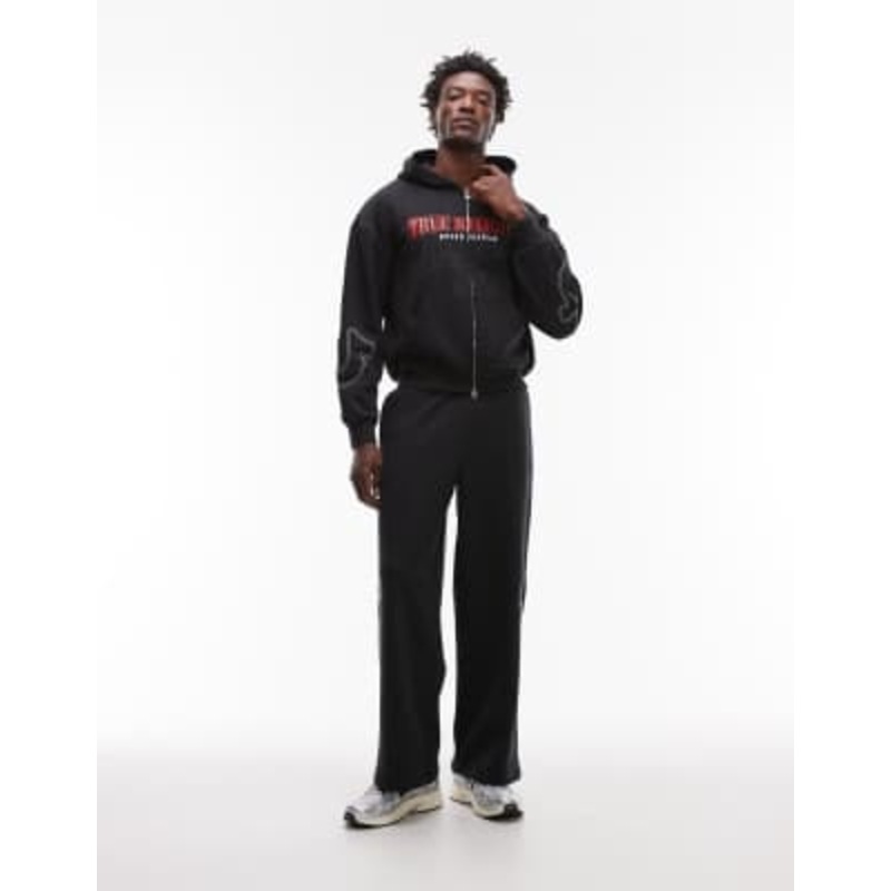 True Religion Big T logo baggy sweatpants in black – part of a set