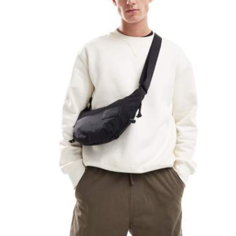 The North Face Never Stop sling cross body bag in black