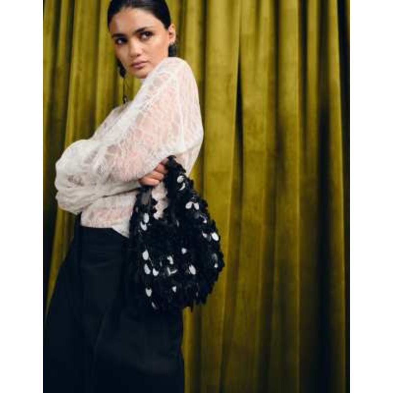 Accessorize sequin fringed handheld bag in black