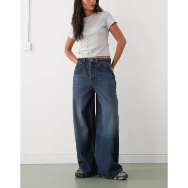 COLLUSION X007 XL baggy low rise jeans in grunge slubby mid wash