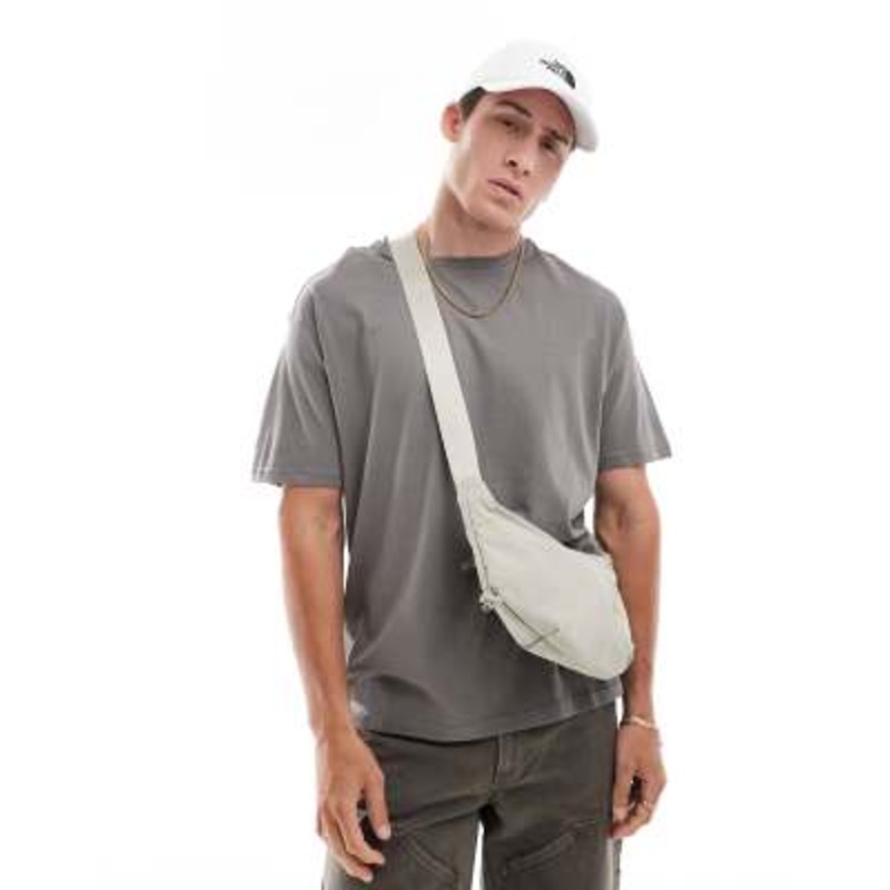 The North Face Never Stop sling cross body bag in clay gray