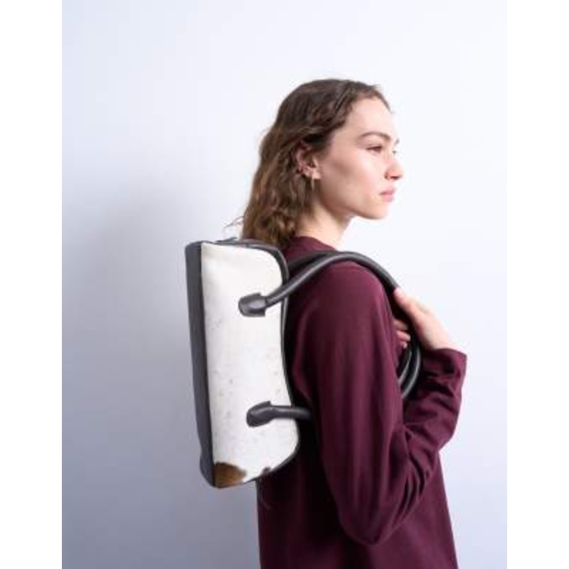 Topshop Sullivan real leather bowler shoulder bag in cow print pony