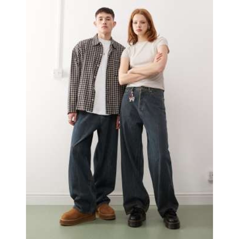 Weekday Astro Unisex low rise loose fit baggy jeans in streaky mid blue wash