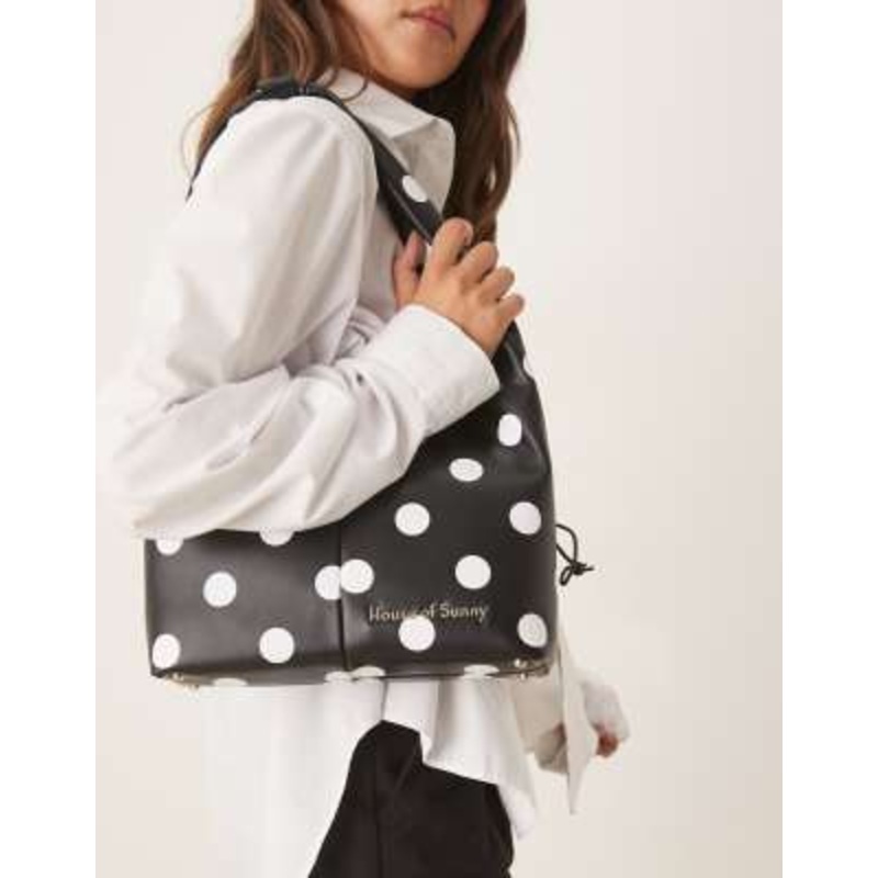 House of Sunny polka dot sling bag in black