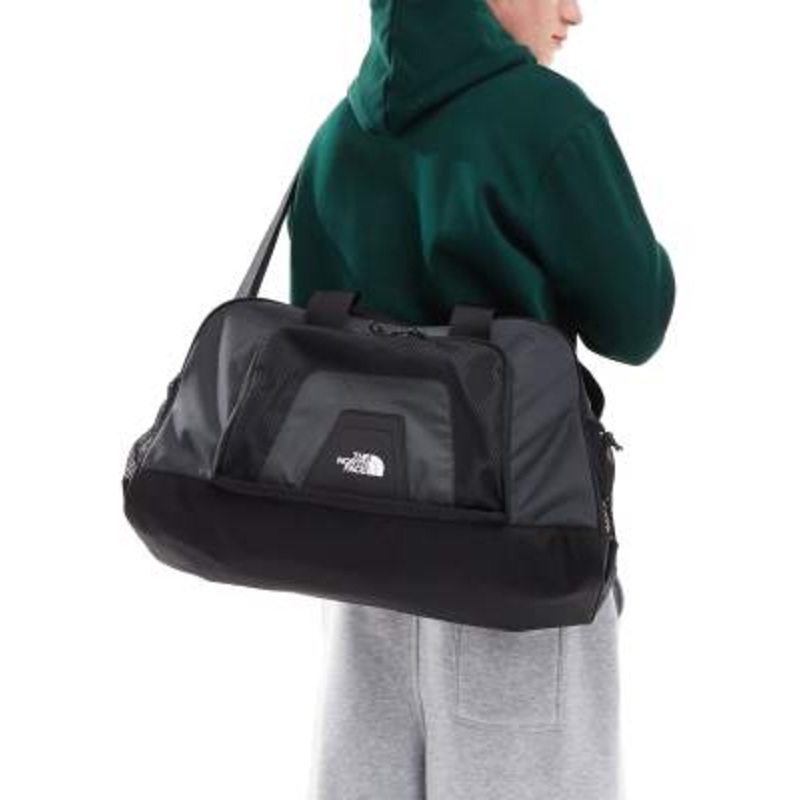 The North Face Y2K duffle bag in black and gray