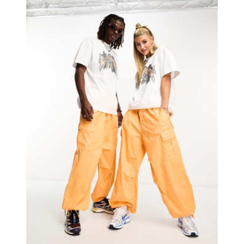 Weekday Unisex parachute baggy pants in orange exclusive to