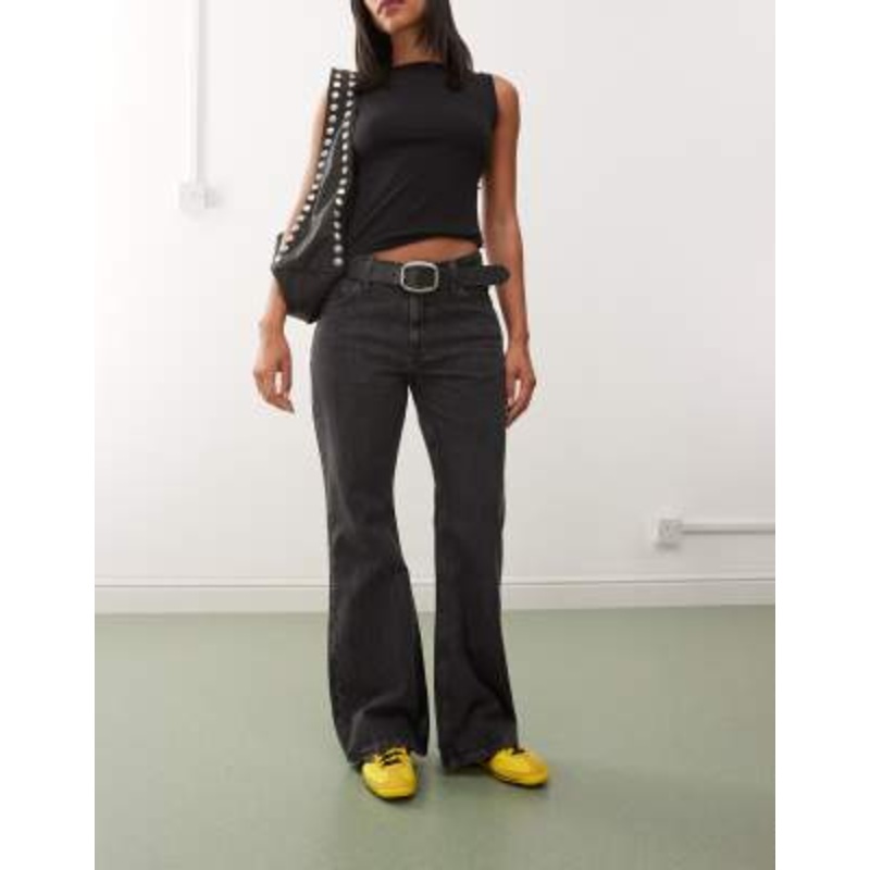 Weekday Helix low waist wide flare jeans in worn black wash