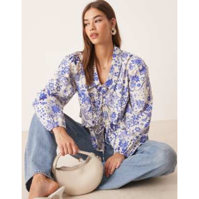 YAS tie front ruffle detail top in blue and white paisley floral print