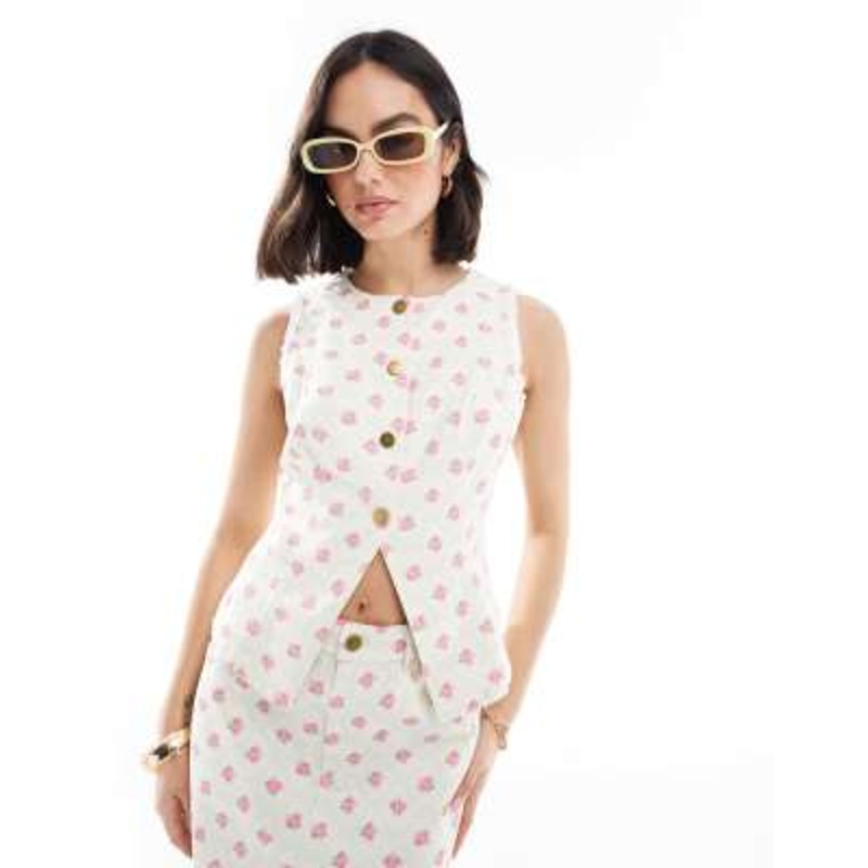 The Frolic exclusive button up split front denim vest in cream and pink floral – part of a set