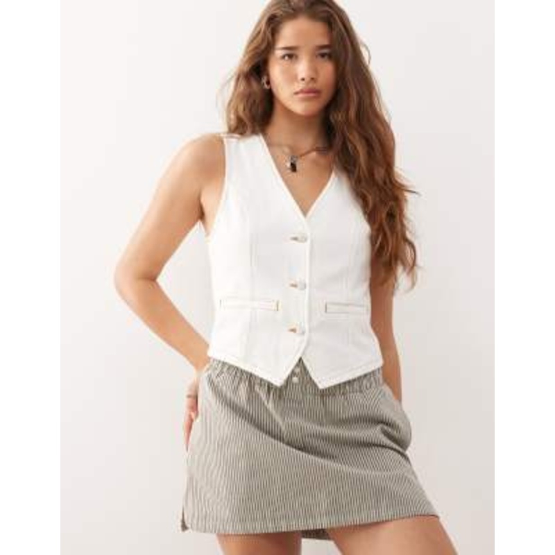 Reclaimed Vintage denim vest in ecru with contrast tobacco stitch