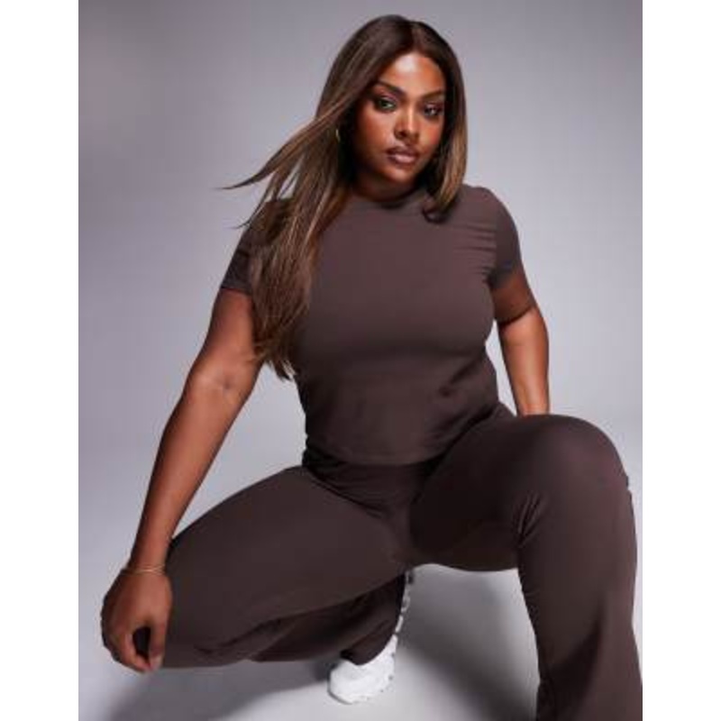 4505 Curve Icon soft touch studio baby T-shirt in plum chocolate