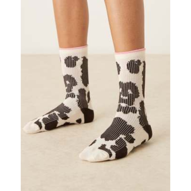 Accessorize cow print socks in black and white