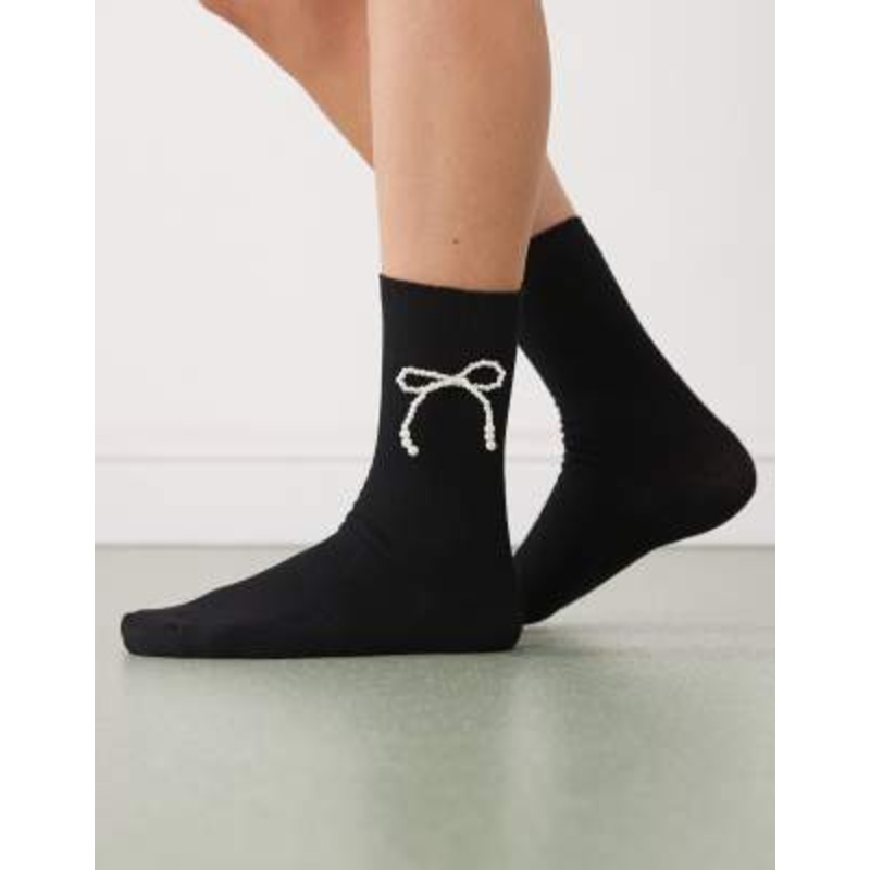 Reclaimed Vintage ankle socks with faux-pearl bows in black