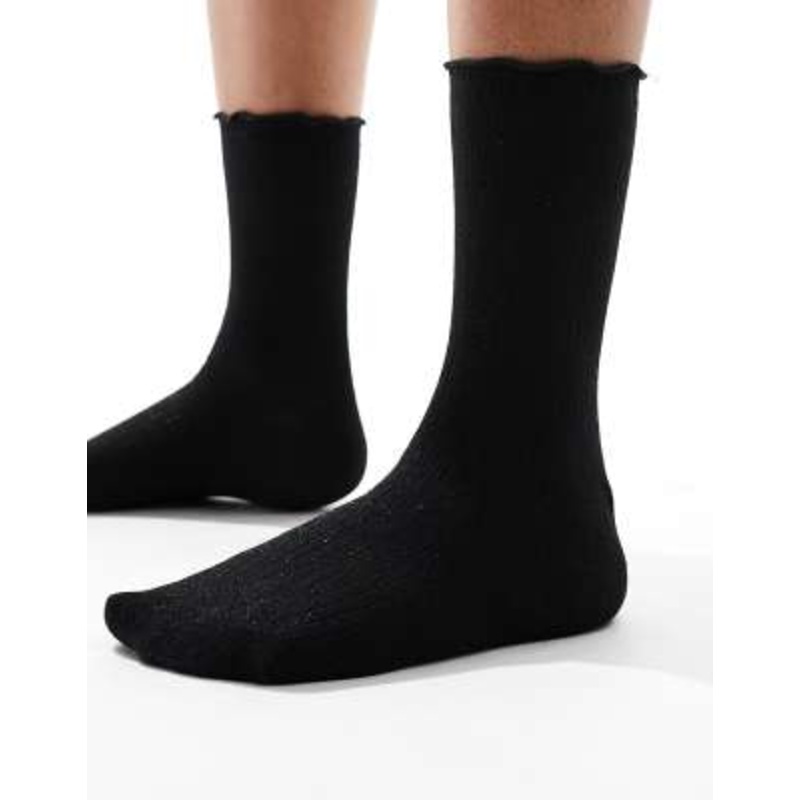 Vero Moda ribbed glitter sock with frill edge in black