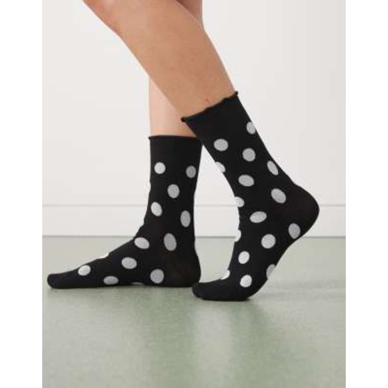 Reclaimed Vintage ankle socks in black and white polka dots